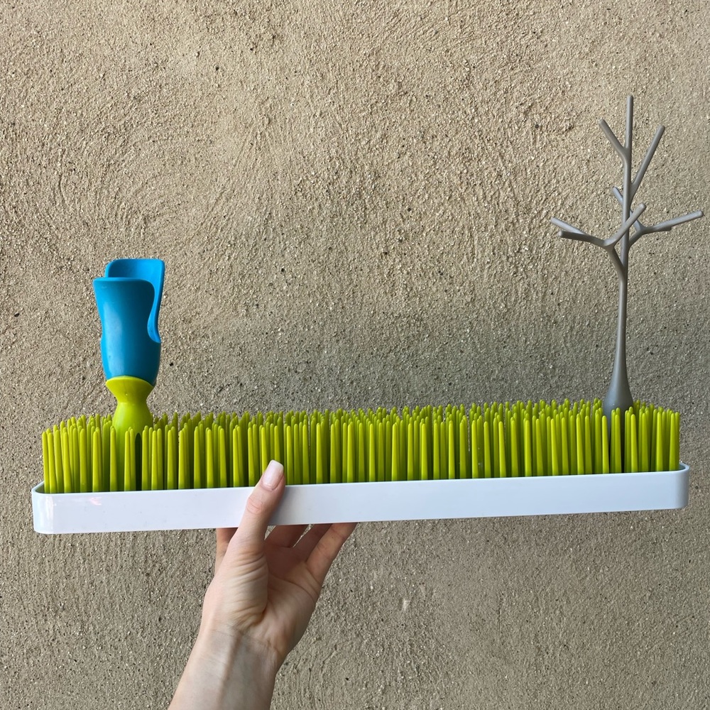 Boon bottle rack with accessories. (Value $40)